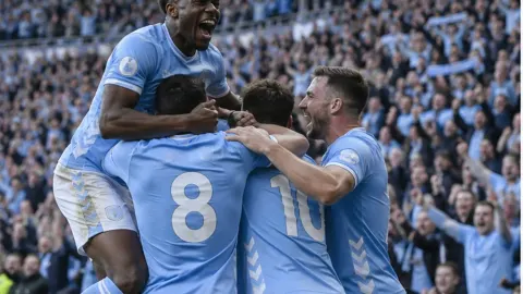Editorial illustration of anonymous sky-blue footballers celebrating a historic winning goal