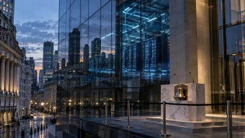 Editorial illustration of a data centre reflected in a stock exchange building beside an unused opening bell