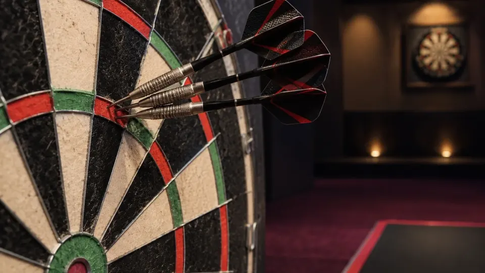 Editorial illustration showing three darts grouped on a board in a quiet competition venue.